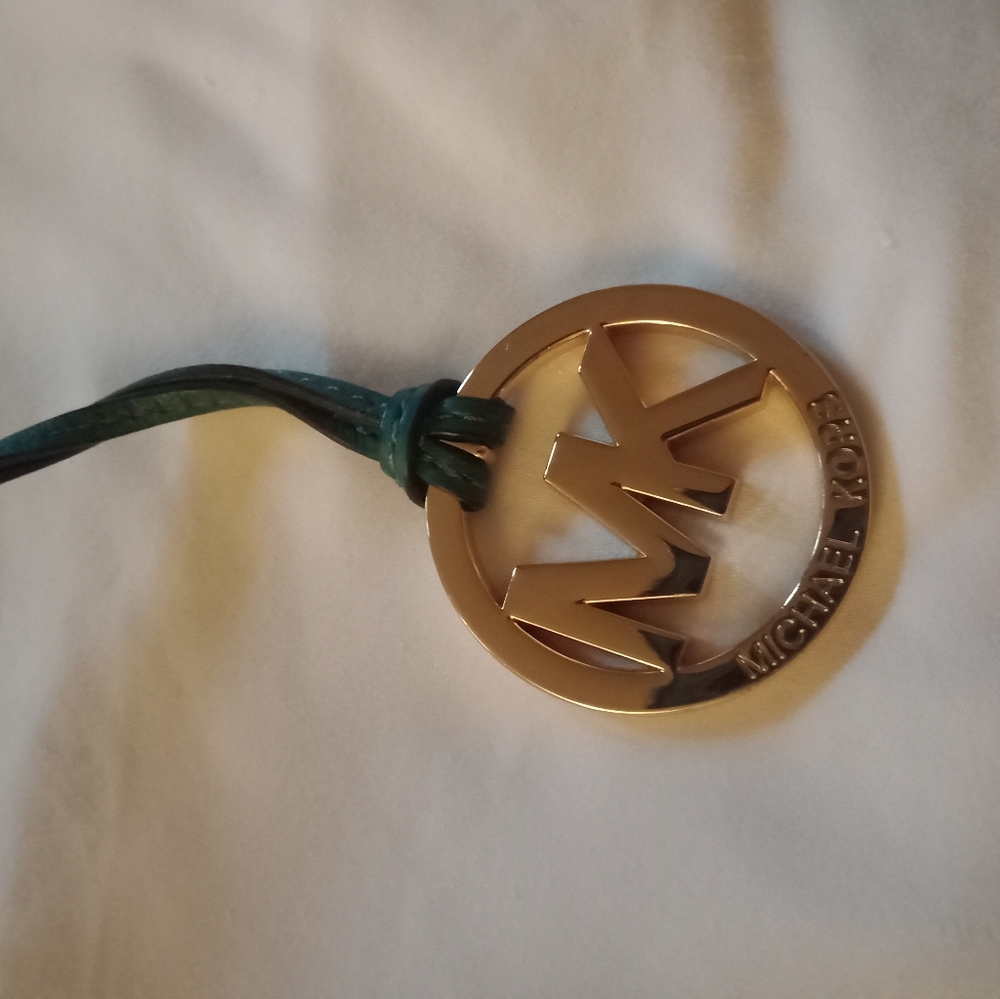 MK bag metal logo